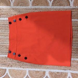Women's coral pencil skirt with black button detail size 6